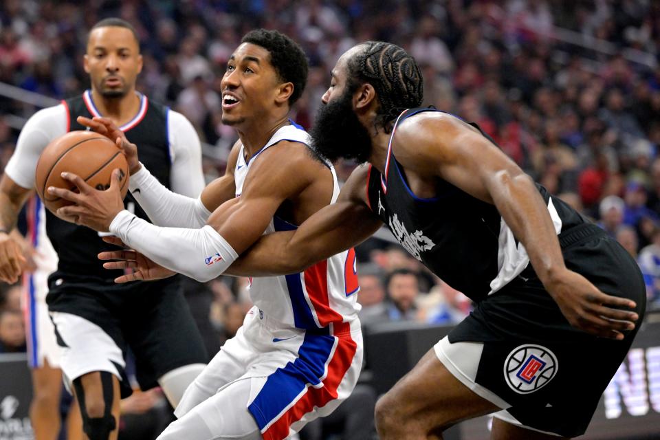 Detroit Pistons guard Jaden Ivey (23) drives past Los Angeles Clippers guard James Harden (1) in the first half at Crypto.com Arena in Los Angeles on Saturday, Feb. 10, 2024.