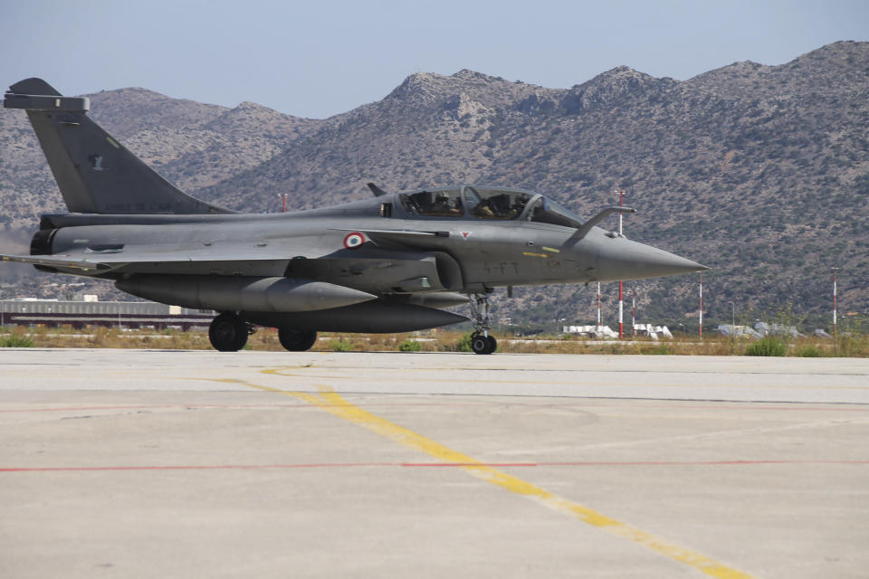 CORRECTS SPELLING OF DEFENCE In this photo provided by the Greek National Defence, a French Rafale fighter jet at Souda airbase on the island of Crete, Thursday, Aug. 13, 2020. Greece's prime minister warmly thanked France Thursday for its decision to boost its military presence in the eastern Mediterranean, where Greek and Turkish warships are closely shadowing each other over a Turkish energy exploration bid in waters Athens claims as its own. (Hellenic National Defence via AP)