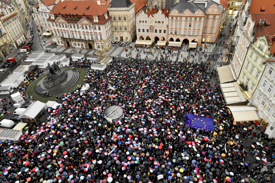 Thousands of people take part in a march in the centre of Prague, Monday April 29, 2019, to protest the proposed replacement of the justice minister. The protesters said Monday it might compromise the legal system at a time when prosecutors have to decide whether to indict Prime Minister Andrej Babis over alleged fraud involving European Union funds. (Vit Simanek/CTK via AP)