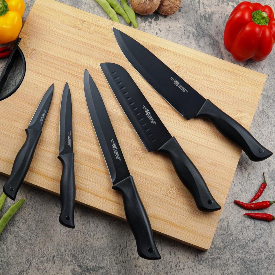 the Amazon knives on a wooden cutting board