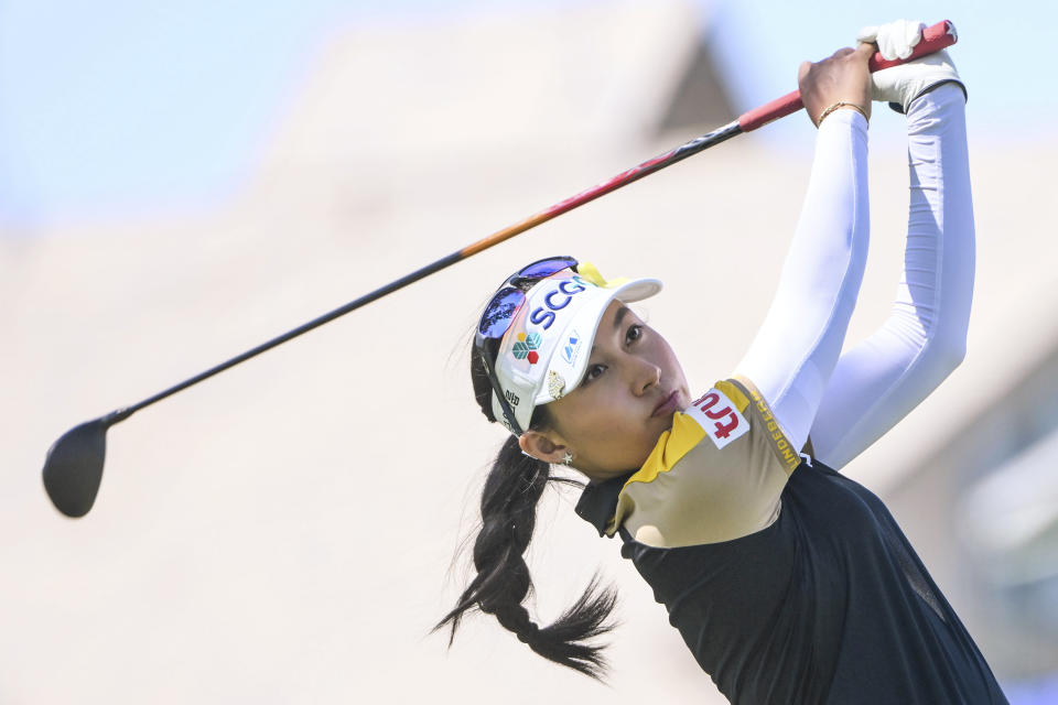 FILE - Atthaya Thitikul of Thailand watches her shot on the 16th hole during the LPGA Walmart NW Arkansas Championship golf tournament on Sept. 25, 2022, in Rogers, Ark. Atthaya Thitikul shot a 9-under 63 on Thursday, Oct. 20, to lead after the first round of the LPGA BMW Ladies Championship in South Korea. She was a stroke ahead of Minsol Kim and three up on a trio of players: A Lim Kim, Andrea Lee, and Yaeeun Hong. (AP Photo/Michael Woods, File)