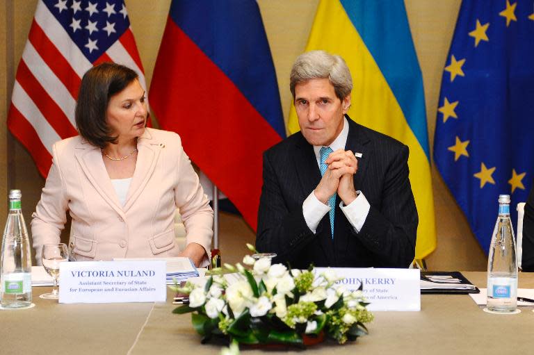 US Secretary of State John Kerry (R) and US Assistant Secretary of State for European and Eurasian Affairs Victoria Nuland attend talks in Geneva