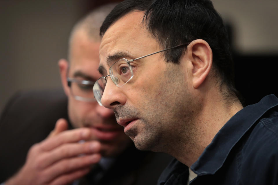 Former doctor Larry Nassar listens to many testimonies from women he sexually abused. (Photo: Getty Images)