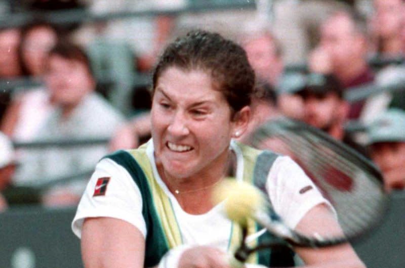 Monica Seles defeats Tara Snyder at the U.S. Open Championships in Flushing Medow, N.Y., on August 27, 1997. On April 30, 1993, Seles was stabbed and injured by a self-described fan of Steffi Graf during a match in Hamburg, Germany. File Photo by Rodger Celestin/UPI