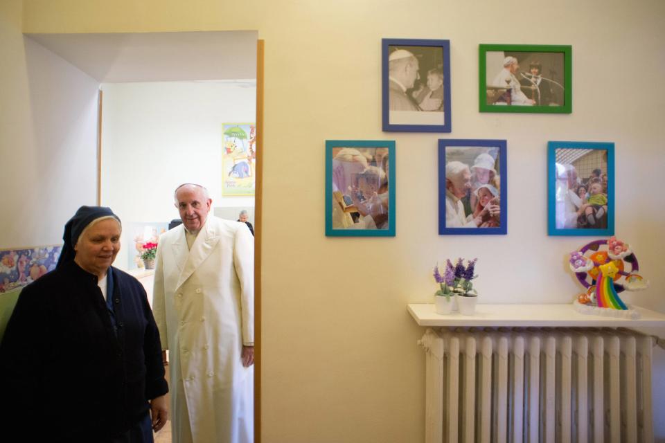 Pope Francis arrives to visit the Pediatric Dispensary of Santa Marta at the Vatican