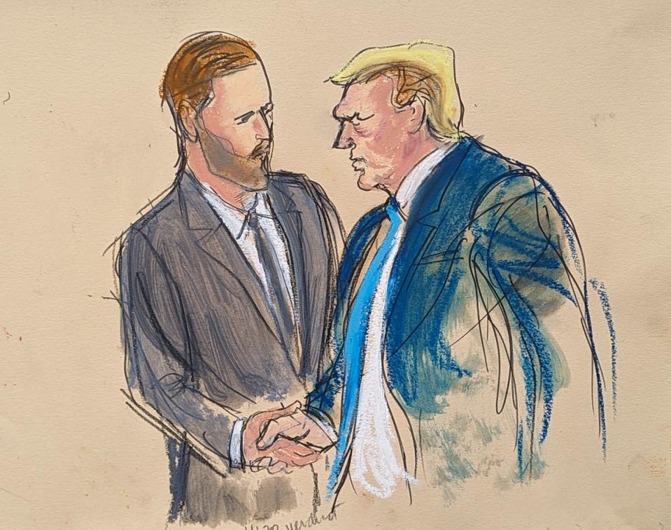 A court sketch of former president Donald Trump, right, shaking his son Eric Trump's hand as he walks out of the courtroom in Manhattan Criminal Court on May 30 (AP)