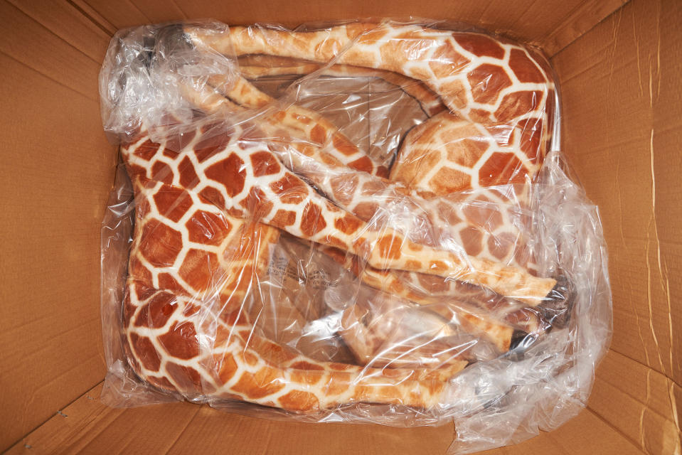 A shipment of toy giraffes at the Viahart distribution facility in Wills Point, Texas on July 23, 2021.<span class="copyright">Jonathan Zizzo for TIME</span>