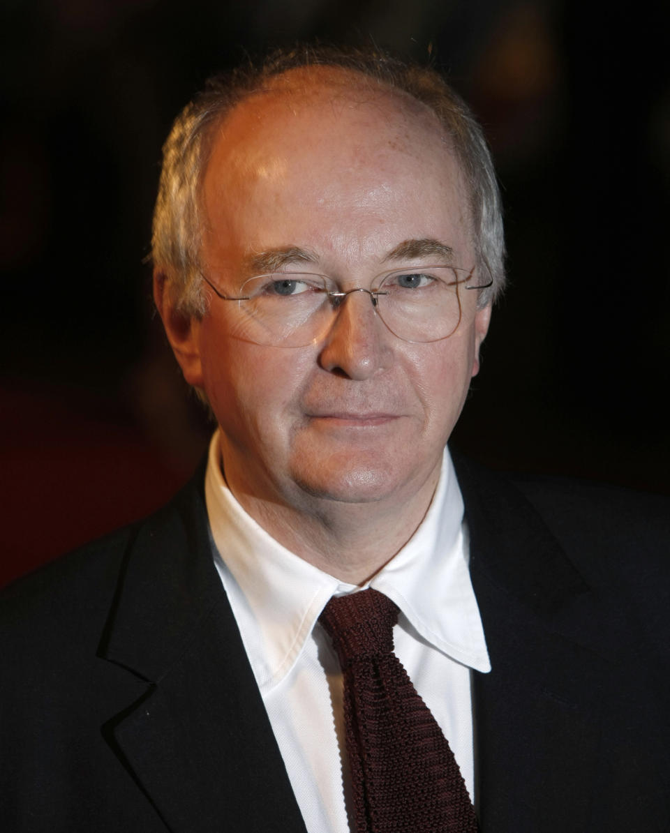 FILE - In this Nov. 27, 2007, file photo British writer Philip Pullman arrives for the world premiere of the film "The Golden Compass" at a cinema in London. Pullman is among those being recognized in Britain’s royal New Year’s Honors List, according to the list of recipients released Friday Dec. 28, 2018. (AP Photo/Matt Dunham,File)