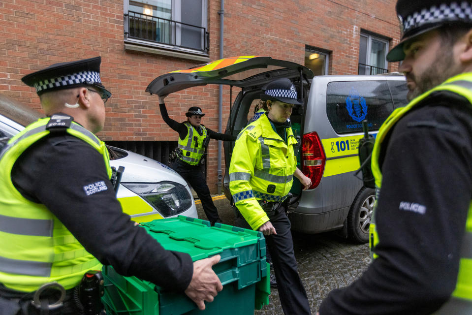 Police officers attend the Scottish National Party's offices on April 5 in Edinburgh, Scotland.<span class="copyright">Robert Perry—Getty Images</span>