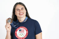 United States' Ilona Maher, bronze medalist in the women's rugby sevens, poses for a portrait with her medal at Champions Park during the 2024 Summer Olympics in Paris, France, Wednesday, July 31, 2024. (Thibaud Moritz/Pool Photo via AP)