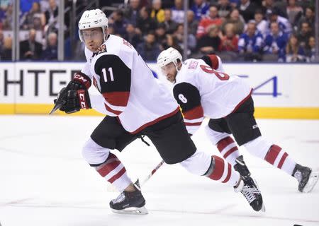 Nov 20, 2017; Toronto, Ontario, CAN; Arizona Coyotes forward Brendan Perlini (11) and forward Tobias Rieder (8) skate on the ice during the third period against the Toronto Maple Leafs at Air Canada Centre. Dan Hamilton-USA TODAY Sports