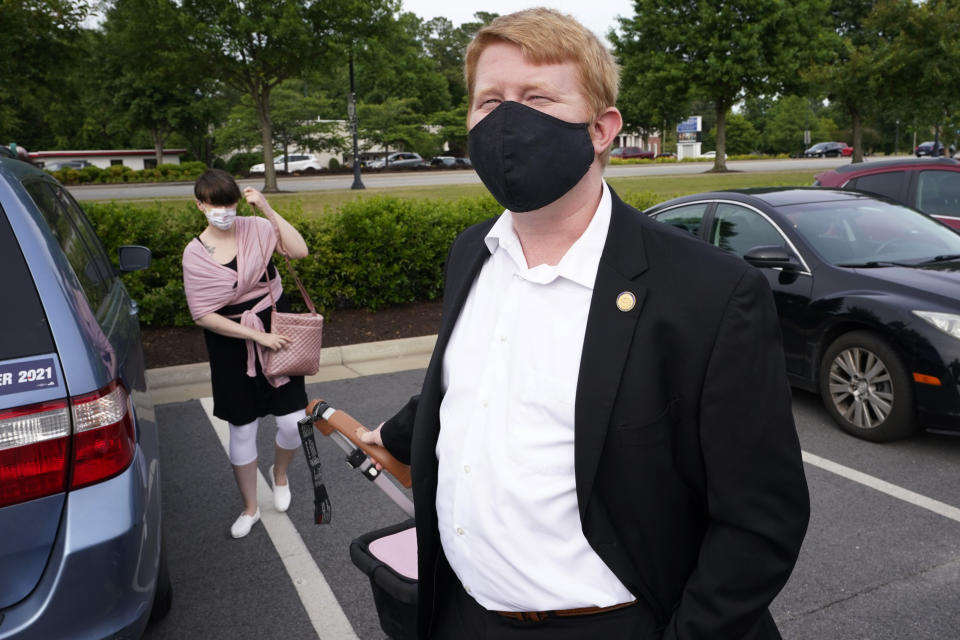 Democratic gubernatorial candidate, Del. Lee Carter, D-Manassas, arrives for the last primary debate in Newport News, Va., Tuesday, June 1, 2021. Carter faces four other Democrats in the primary June 8. (AP Photo/Steve Helber)