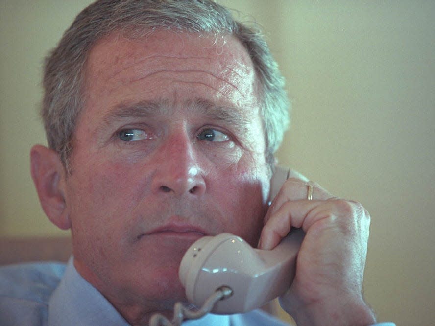 George W. Bush on the phone.