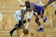 Boston Celtics center Tristan Thompson (13) steals the ball from Phoenix Suns guard Chris Paul (3) in the first quarter of an NBA basketball game, Thursday, April 22, 2021, in Boston. (AP Photo/Elise Amendola)