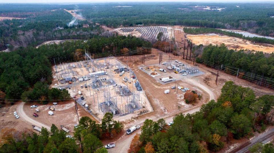 An aerial view of an electrical power substation in West End, Tuesday, Dec. 6, 2022 where crews are working to repair damage after two deliberate attacks on electrical substations in Moore County Saturday evening. The attacks caused days-long power outages for tens of thousands of customers.