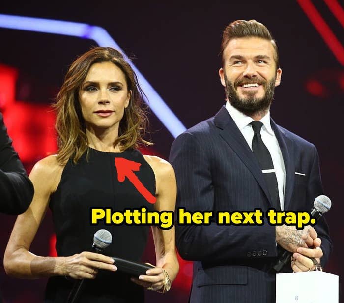 Victoria standing next to David with a caption pointing at her that says "Plotting her next trap"