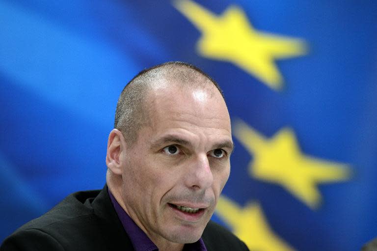 Greek Finance Minister Yanis Varoufakis arrives to present his ministry's new secretaries at a press conference in Athens on March 4, 2015