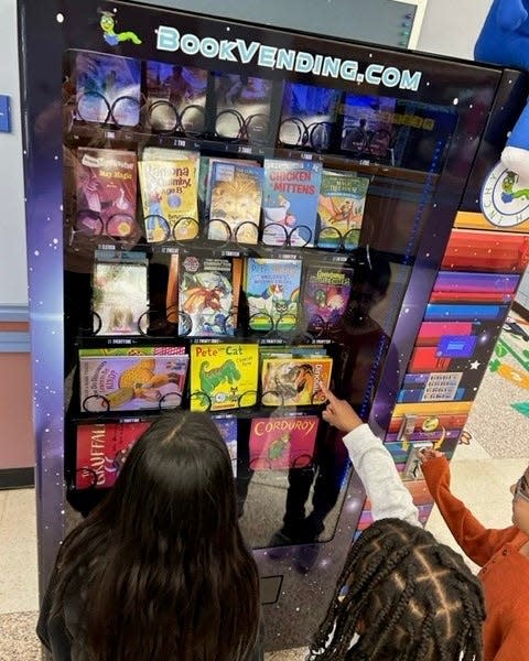 Knollwood Elementary School's new book vending machine stocked with a wide selection of books for young readers.