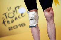 <p>A bandage is seen on the knee of Yellow jersey leader Team Sky rider Chris Froome of Britain during podium ceremony after Tour de France’s Stage 19 from Albertville to Saint-Gervais Mont Blanc, France on July 22, 2016. (Juan Medina/Reuters)</p>