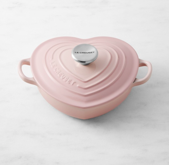 <p><strong>Le Creuset</strong></p><p>williams-sonoma.com</p><p><strong>$150.00</strong></p><p><a href="https://go.redirectingat.com?id=74968X1596630&url=https%3A%2F%2Fwww.williams-sonoma.com%2Fproducts%2Fle-creuset-ennameled-cast-iron-shallow-heart-1-1-4-qt%2F&sref=https%3A%2F%2Fwww.menshealth.com%2Ftechnology-gear%2Fg35256368%2Fvalentines-day-gifts-for-mom%2F" rel="nofollow noopener" target="_blank" data-ylk="slk:Shop Now;elm:context_link;itc:0" class="link ">Shop Now</a></p><p>What's better than a slow-cooked, one-pot dinner for two? One made in a beautiful pink heart, of course. This one is made of enameled cast iron, meaning whatever it is you're cooking be treated to an even amount of heat, maximizing deliciousness and earning you some chef points.</p>