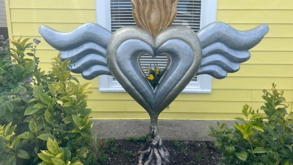 <div>A traditional corazon (heart) sculpture with wings, roots and flames is a memorial to victims and survivors of the Half Moon Bay mass shooting on January 23, 2023.</div>