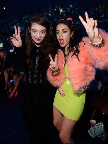 <p>Kevin Mazur/MTV1415/WireImage</p> Lorde and Charli XCX in Los Angeles in August 2014