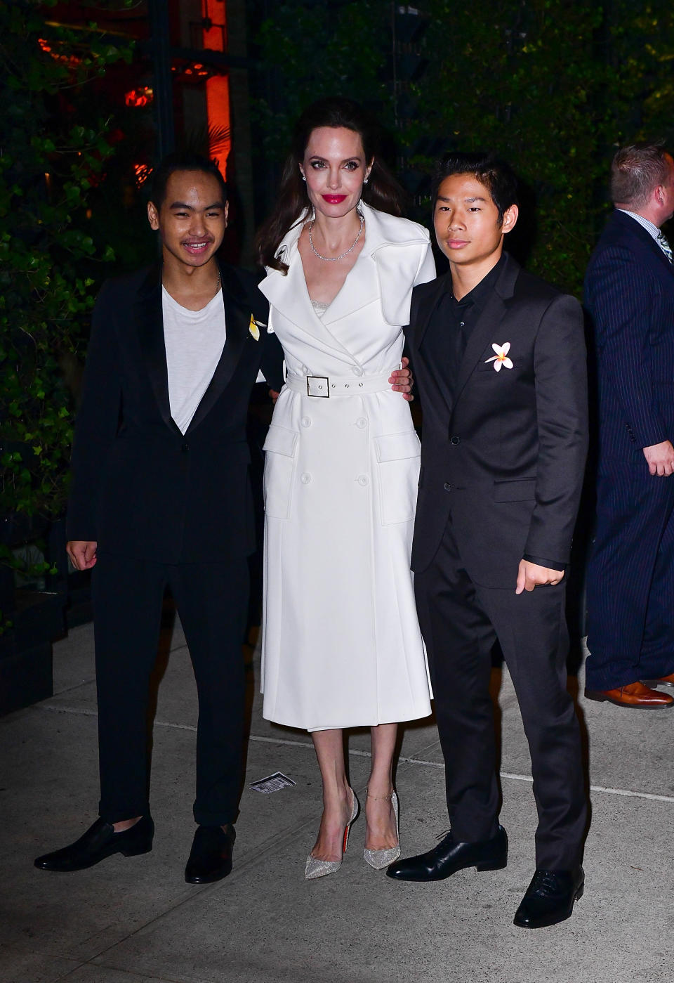 <p>Following an outfit change, Angelina and her big boys, Maddox and Pax, hit the after-party for the movie at Jams in NYC. (Photo: James Devaney/GC Images) </p>