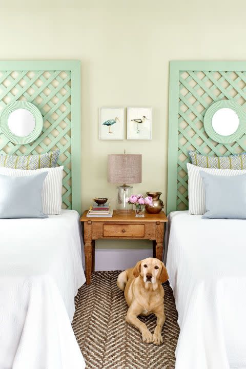 bedroom with green trellis headboards