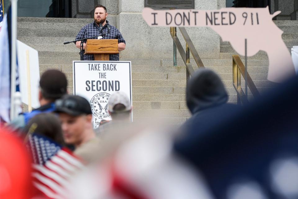 Evan Todd, who survived the 1999 Columbine High School shooting, speaks during the Rally for our Rights: Take back the Second demonstration at the Colorado State Capitol in Denver, Colo., on May 18, 2019.