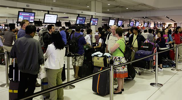 Passengers queue for a special flight bound for Singapore as flights are delayed and cancelled following the eruption of Iceland's Eyjafjallajokull volcano in 2010. Photo: Getty Images