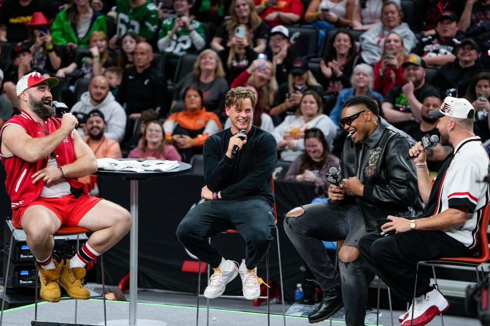 Joe Burrow and Orlando Brown Jr. joined Jason and Travis Kelce for their live "New Heights" show at the University of Cincinnati on April 11.