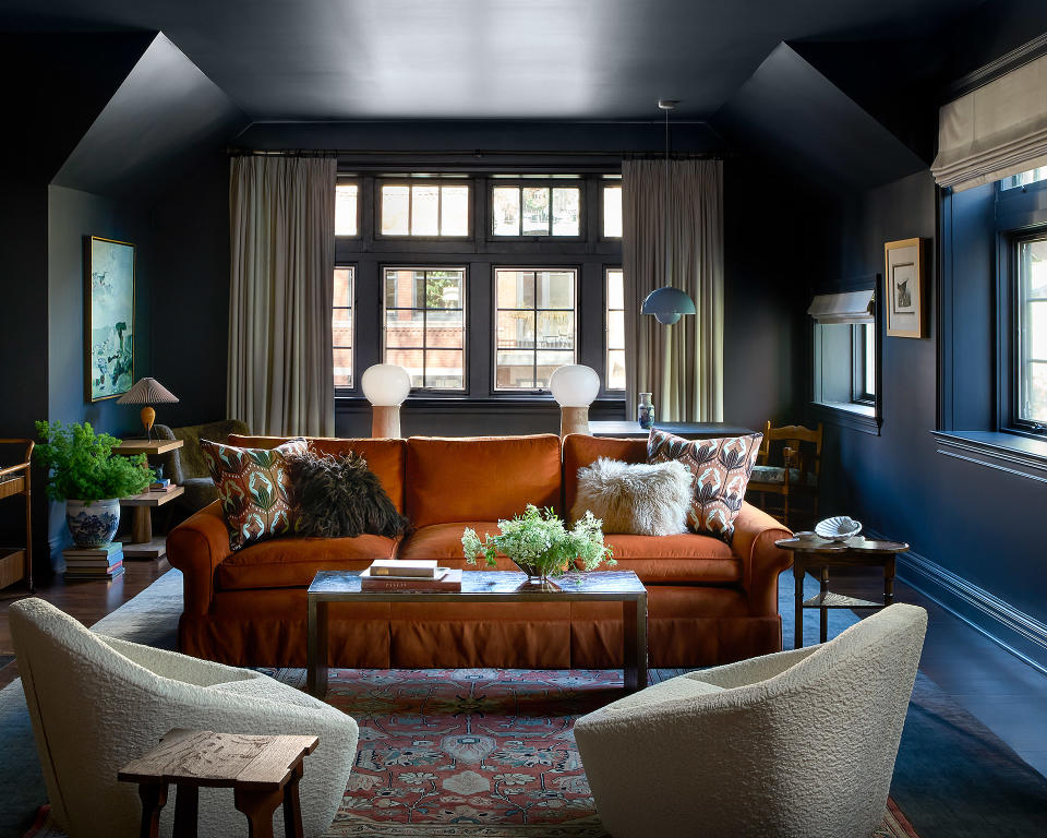 A living room drenched in blue