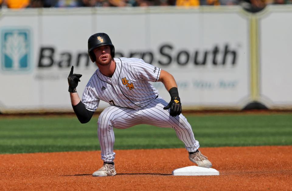 Southern Miss outfielder Slade Wilks (7) gestures after hitting a double against the Ole Miss during Game 1 of the NCAA Super Regional at Pete Taylor Park in Hattiesburg on Saturday, June 11.