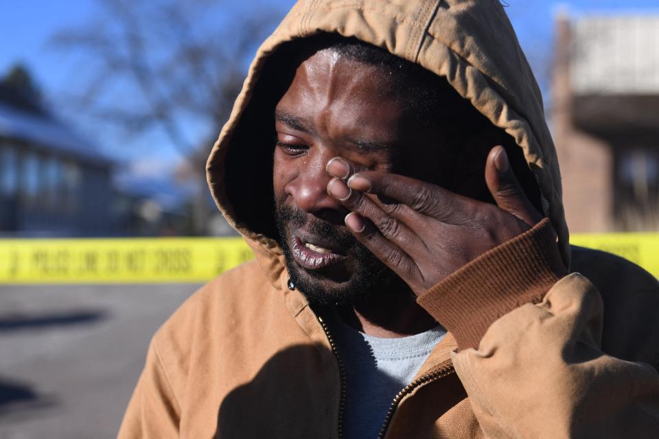 Joshua Thurman, of Colorado Springs, reacts the morning after a mass shooting at Club Q, an LGBTQ nightclub in Colorado Springs, Colorado, on November 20, 2022.