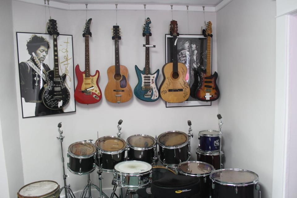 Autographed guitars, drums and more are part of the Performing Arts Legend Museum in Ambridge.