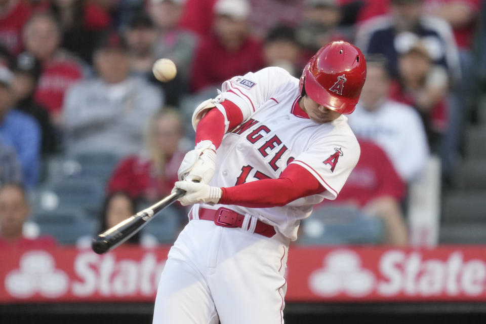 Los Angeles Angels designated hitter Shohei Ohtani (17) flies out during the first inning of a baseball game against the Houston Astros in Anaheim, Calif., Monday, May 8, 2023. (AP Photo/Ashley Landis)