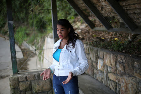 Yosneilis Calzadilla speaks during an interview with Reuters at the place where, she says, her boyfriend, Jhon Mijares, was detained, in El Junquito, Venezuela, February 15, 2019. Picture taken February 15, 2019. To match Insight VENEZUELA-POLITICS/EVIDENCE. REUTERS/Andres Martinez Casares