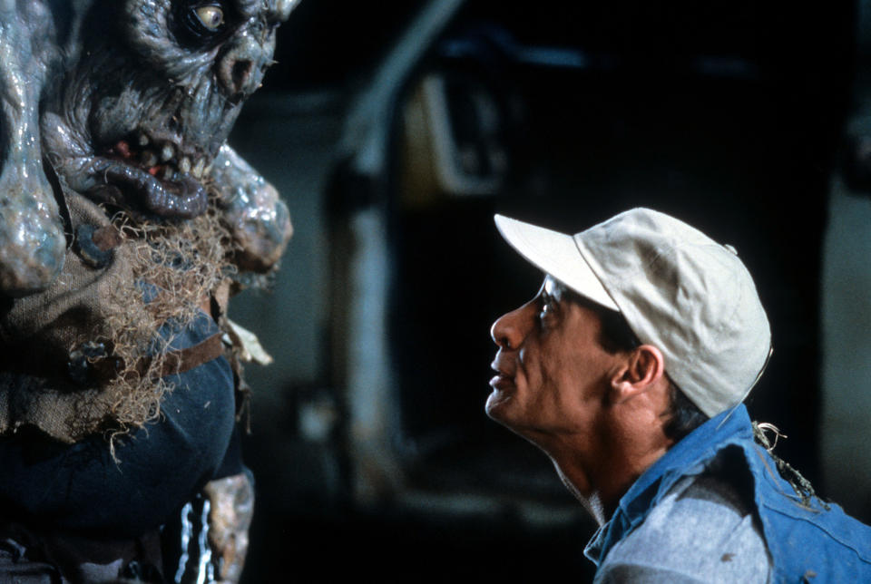 Jim Varney looking at monster in a scene from the film 'Ernest Scared Stupid', 1991. (Photo by Touchstone/Getty Images)