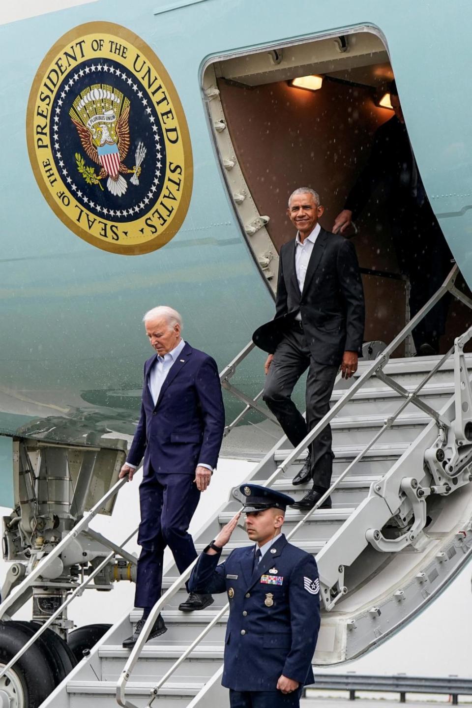 PHOTO: President Joe Biden and former President Barack Obama leave Air Force One at John F. Kennedy International Airport, March 28, 2024, in New York. (Elizabeth Frantz/Reuters)