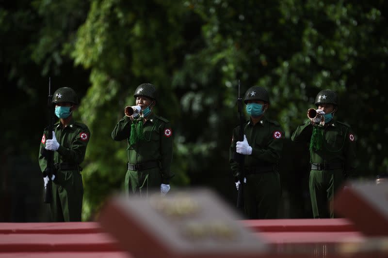 Myanmar soldiers take part in a ceremony to mark the 73rd anniversary of Martyrs' Day in Yangon