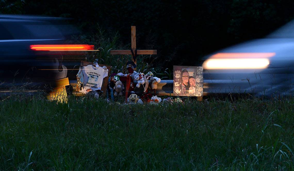 Cars speed past a memorial along U.S. 74 in Gaston County for 6-year-old Liam Lagunas who was fatally injured at the site in 2021.