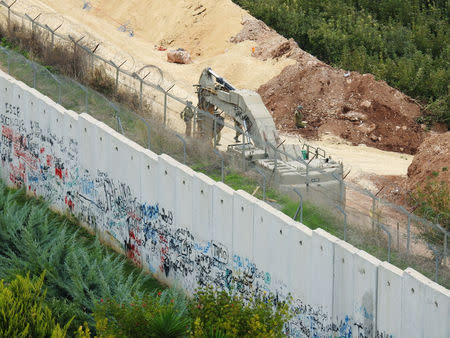 Israeli soldiers patrol the border near the village of Kfar Kila, Lebanon December 4, 2018. REUTERS/ Karamallah Daher