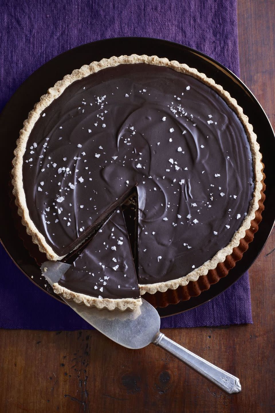<p>Technically, ganache isn't pie. But with this salty, dark chocolate taste, we don't think your guests will mind. </p><p><a href="https://www.goodhousekeeping.com/food-recipes/a14001/ganache-tart-salted-almond-crust-recipe-ghk0212/" rel="nofollow noopener" target="_blank" data-ylk="slk:Get the recipe for Ganache Tart with Salted-Almond Crust »;elm:context_link;itc:0;sec:content-canvas" class="link ">Get the recipe for Ganache Tart with Salted-Almond Crust »</a><br></p><p><strong>RELATED:</strong><a href="https://www.goodhousekeeping.com/holidays/easter-ideas/g3299/bunny-shaped-desserts/" rel="nofollow noopener" target="_blank" data-ylk="slk:17 Bunny-Shaped Treats for Easter;elm:context_link;itc:0;sec:content-canvas" class="link "> 17 Bunny-Shaped Treats for Easter</a></p>