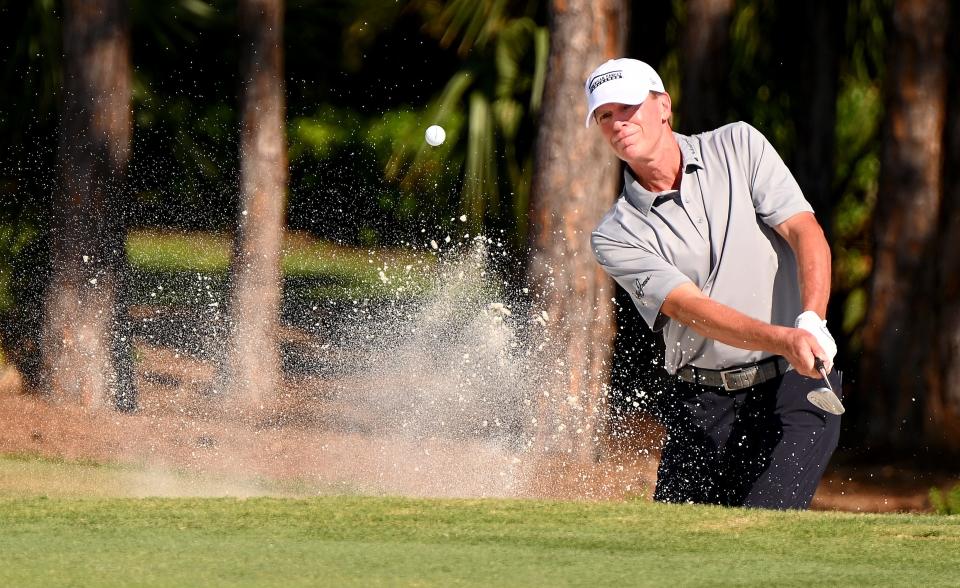 Steve Stricker chips onto the green from the sand on the sixth hole during the second round of the PGA QBE Shootout Golf tournament at the Tiburon Golf Club, Saturday, Dec.10, 2022, in Naples.