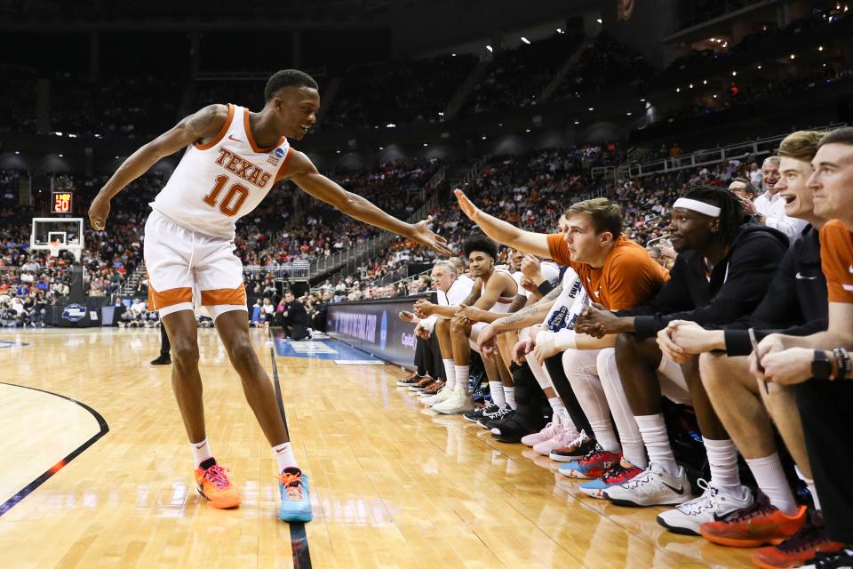 Mar 24, 2023; Kansas City, MO, USA; Texas Longhorns guard Sir'Jabari Rice (10) reacts after drawing a foul during the second half of an NCAA tournament Midwest Regional semifinal against the Xavier Musketeers at T-Mobile Center.