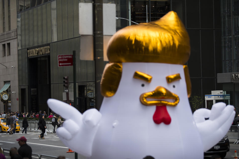 The "Trump Chicken" is seen near Trump Tower while activists take part in a Tax Day protest on April 15, 2017 in New York City. Thousands of activists march to Trump Tower to demand that President Donald Trump release his tax returns. Photographer: by Eduardo MunozAlvarez/VIEWpress/Corbis via Getty Images