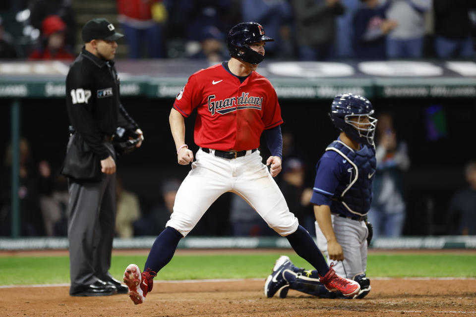 Cleveland Guardians' Will Brennan celebrates after scoring on a double by Steven Kwan during the eighth inning of the team's baseball game against the Tampa Bay Rays, Thursday, Sept. 29, 2022, in Cleveland. (AP Photo/Ron Schwane)