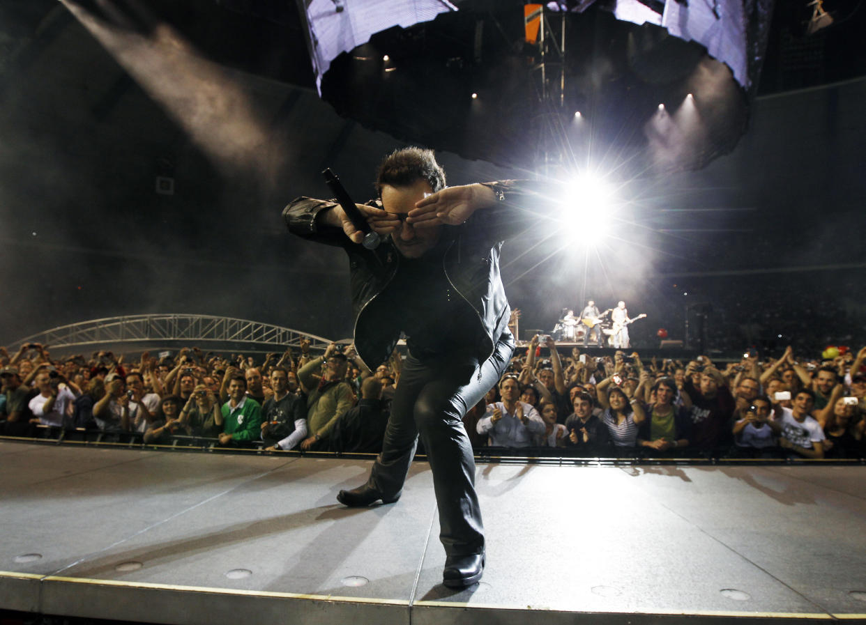 Lead singer Bono of Irish rock band U2 performs during their 360 Degree Tour at King Baudouin Stadium in Brussels September 22, 2010.   REUTERS/Thierry Roge   (BELGIUM - Tags: ENTERTAINMENT)