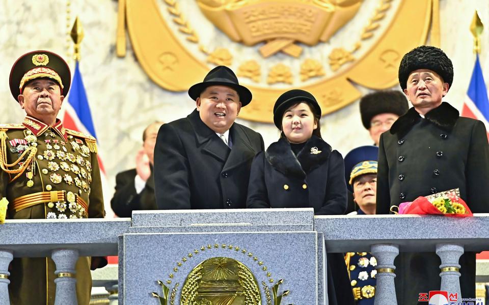 Ju-ae took centre-stage with her father and mother on a VIP balcony at a military parade in February - KCNA via KNS