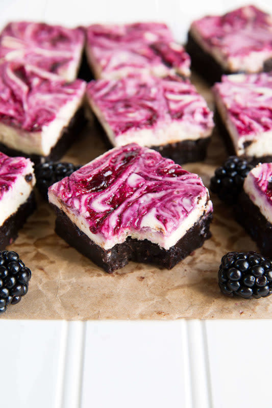 <p>Oh Sweet Basil</p><p>Blackberry cheesecake brownies that will have everyone begging for seconds. A rich brownie base, tangy cheesecake and sweet blackberry swirl!</p><p><strong>Get the recipe: <a href="https://ohsweetbasil.com/blackberry-cheesecake-brownies-recipe/" rel="nofollow noopener" target="_blank" data-ylk="slk:Blackberry Cheesecake Brownies;elm:context_link;itc:0;sec:content-canvas" class="link rapid-noclick-resp">Blackberry Cheesecake Brownies</a></strong></p>